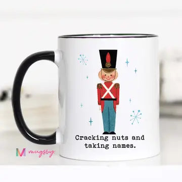 Cracking Nuts Funny Christmas Mug